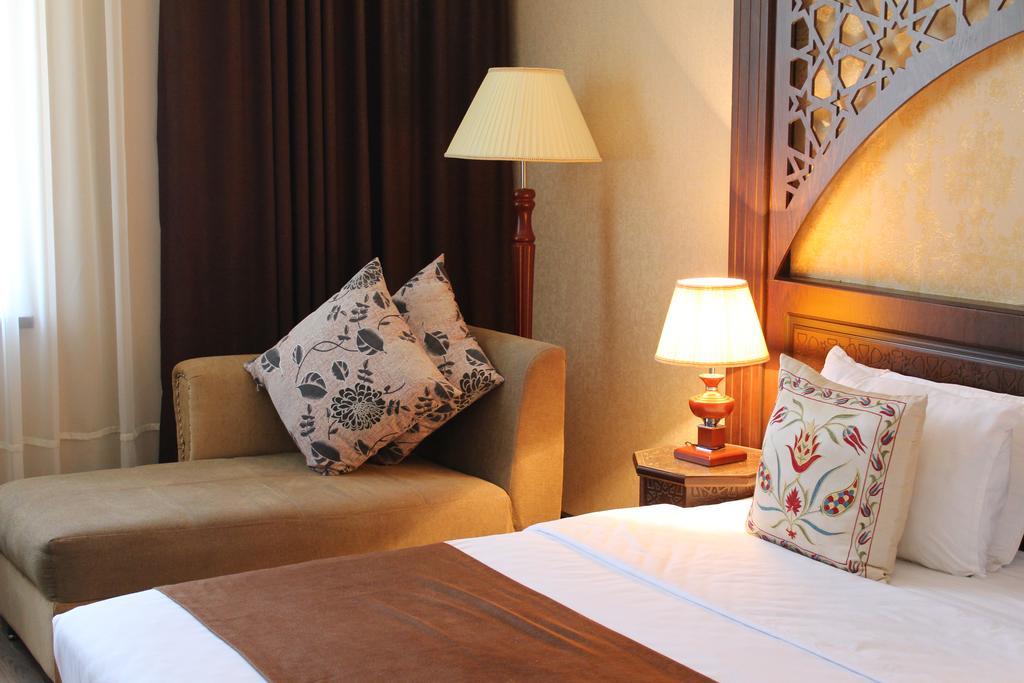 Orient Star Hotel Samarkand Quarto foto
